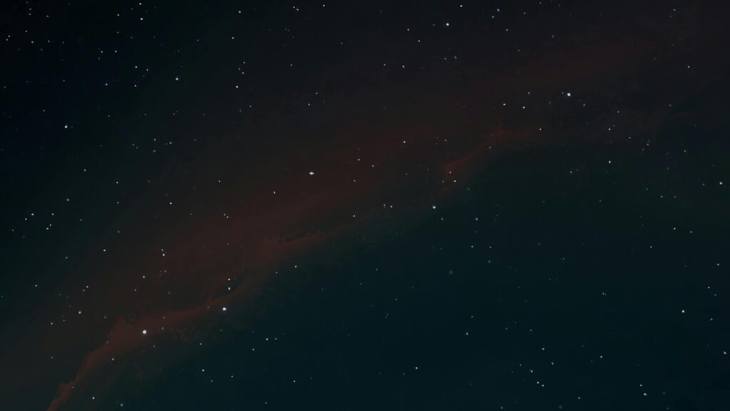 Explore the vast cosmos in this breathtaking starry night sky photograph, capturing space's eternal beauty.